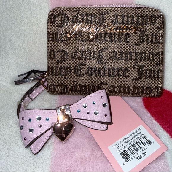 Juicy Couture Handbags - NWT Juicy Couture Tan Wallet with Pink Bow and Heart Charm
